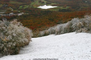 An image of the Hayride trail at Stowe, Vermont with snow and fall foliage after a September & October snowfall