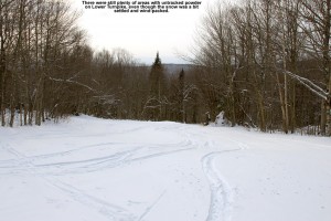 An image of ski tracks in powder snow on the Lower Turnpike trail at Bolton Valley Ski Resort in Vermont