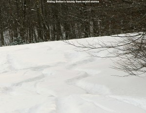 An image of ski tracks in powder on the Spell Binder trail at Bolton Valley