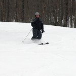 An image of Tim skiing some powder snow on the Spell Binder trail at Bolton Valley Resort in Vermont