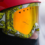 An image of Dylan in his ski goggles looking out the window of the Stowe Gondola at the start of a powder day