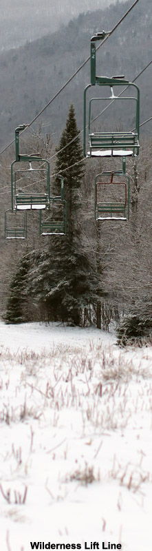 An image of the some chairs on the Wilderness lift at Bolton Valley Ski Resort in Vermont