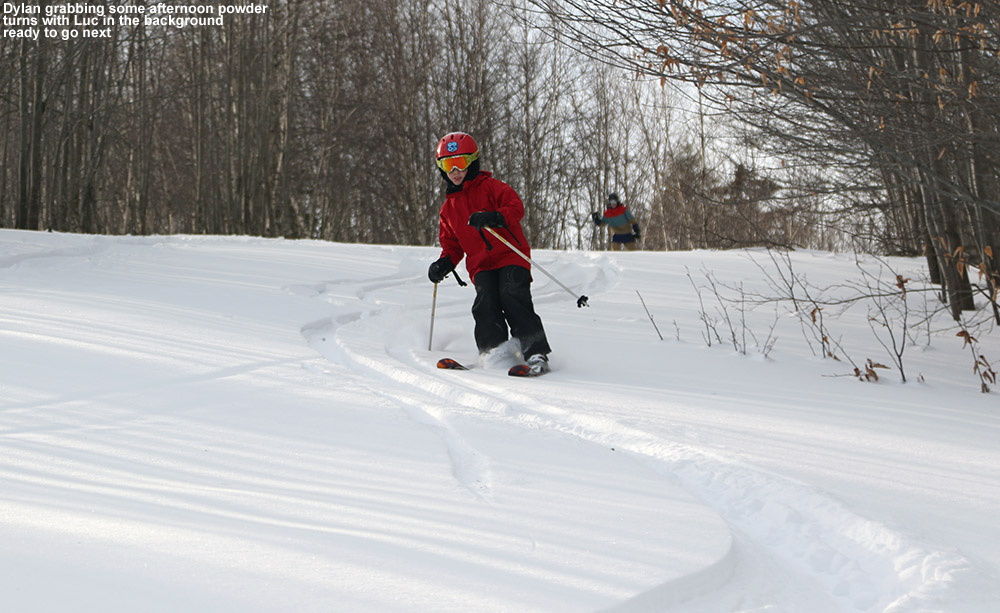 An image of Dylan skiing some powder snow at Stowe Mountain Resort in Vermont
