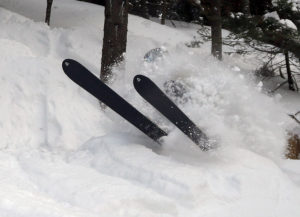 An image of Erica deep in the powder skiing the KP Glades area of Bolton Valley Resort in Vermont
