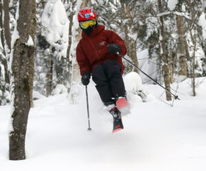 An image of Dylan skiing the trees at Bolton Valley Resort in Vermont