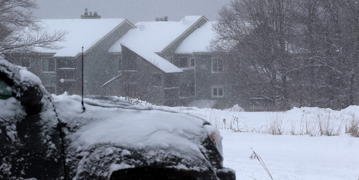 An image from the Bolton Valley Village on Thanksgiving weekend showing snow falling from a departing winter storm