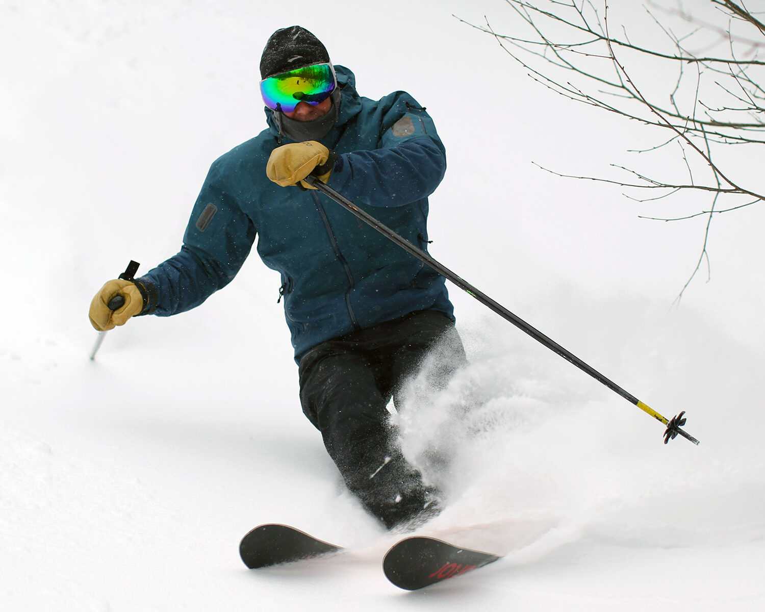 A close-up shot of Dave skiing the powder of Winter Storm Landon at Bolton Valley Ski Resort in Vermont