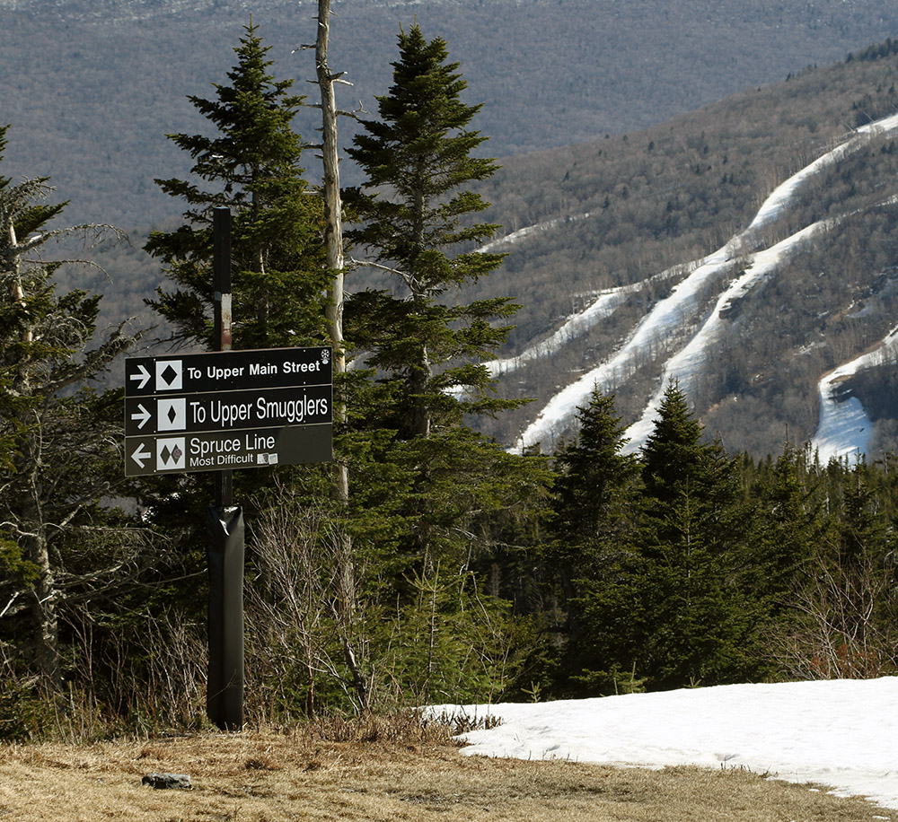An image showing some of the Mount Mansfield ski trails from near the summit of Spruce Peak at Stowe Mountain Resort in Vermont