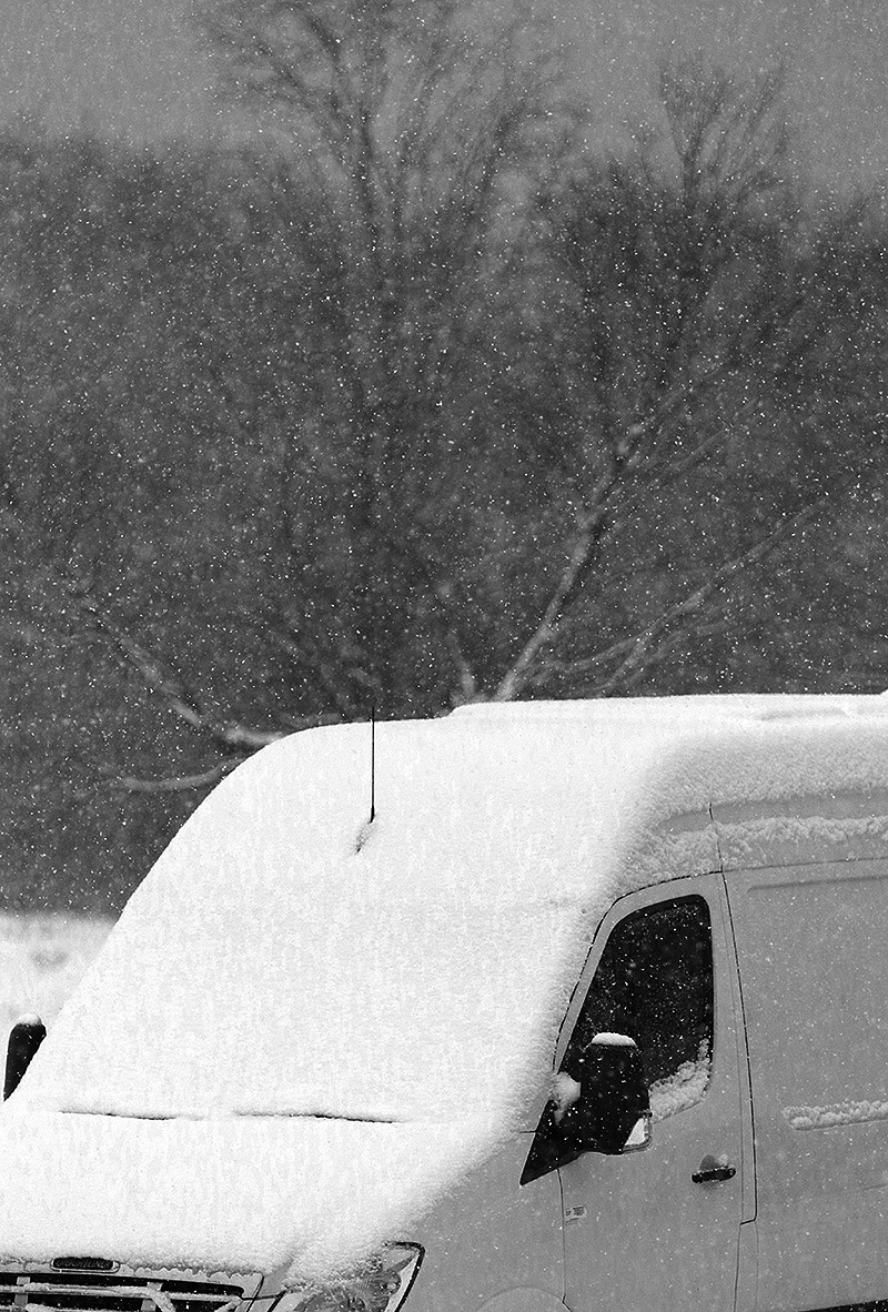 An image of snow accumulations on a van during  a November snowstorm  at Bolton Valley Ski Resort in Vermont