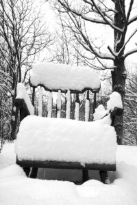 A snowy chair after Winter Storm Diaz at the base area of Bolton Valley Ski Resort in Vermont