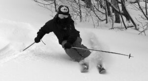 An image of Ty skiing in powder from Winter Storm Iggy at Bolton Valley Ski Resort in Vermont