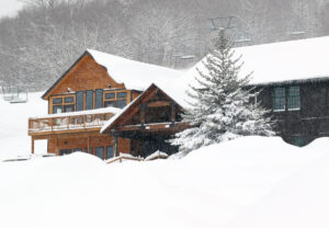 An image of the Timberline Base Lodge after 18 inches of snow had already fallen from Winter Storm Sage at Bolton Valley Ski Resort in Vermont