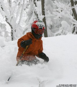 An image of Ty skiing powder in the trees off Wizard Way at Bolton Valley Resort in Vermont