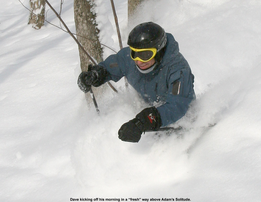 An image of Dave waist deep in the powder in the Adam's Solitude area at Bolton Valley, Vermont
