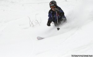 An image of Jay Telemark skiing in the Powder off the side of Bolton Outlaw at Bolton Valley Resort in Vermont
