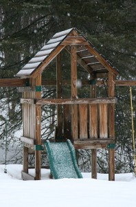 Snowfall and new snow on the playset out back