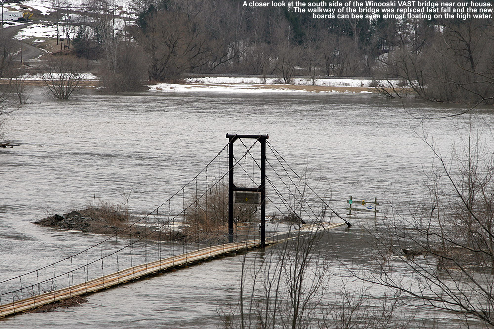 Close up image of the VAST snowmobile bridge at high water