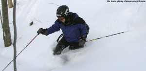 An image of Jay skiing the glades