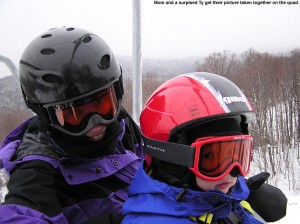 An image of Erica and Ty riding the Vista Quad Chairlift at Bolton Valley Resort in Vermont
