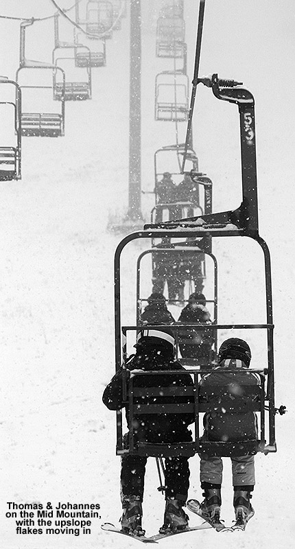 An image of the Mid Mountain Chairlift at Bolton Valley with snow falling on December 23, 2011