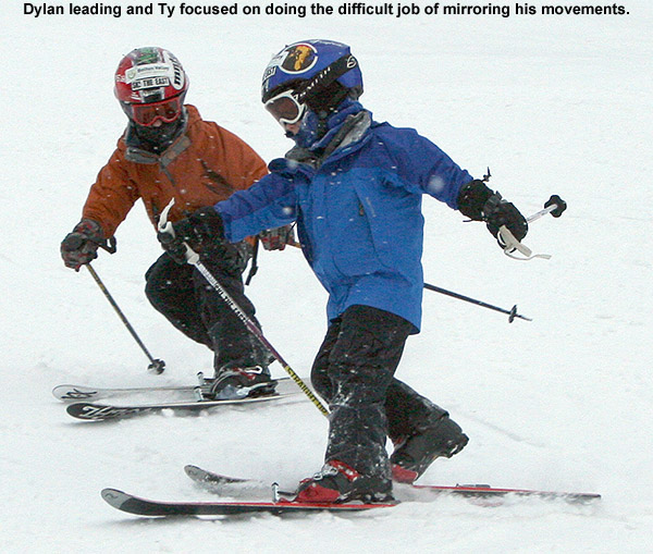 An image of Ty and Dylan attempting synchronous Telemark turns on Bear Run at Bolton Valley Resort in Vermont