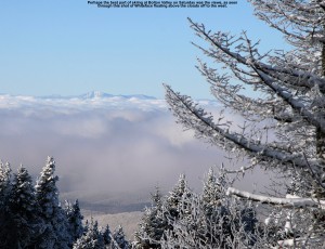 A westward view of Whiteface Mountain above the clouds from Bolton Valley Resort in Vermont