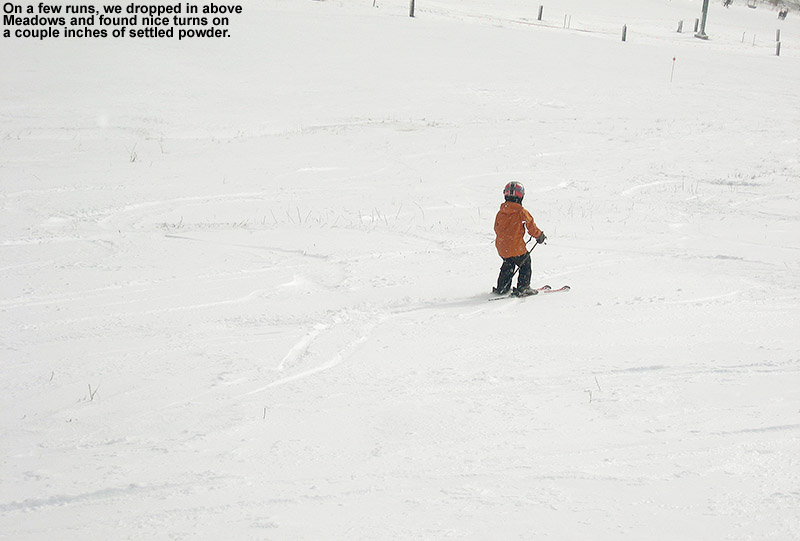 An image of Ty skiing above the Meadows area at Stowe Mountain Resort in Vermont