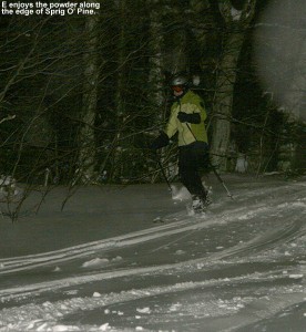 An image of E skiing fresh powder at night on the Sprig O' Pine trail at Bolton Valley Resort in Vermont