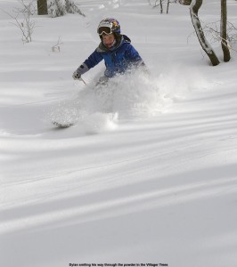 An image of Dylan skiing powder in the Villager Trees at Bolton Valley Resort in Vermont