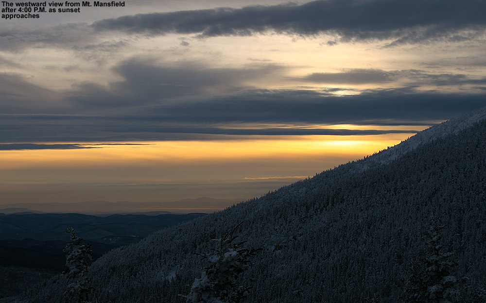 A westward view from near the top of Mount Mansfield in Vermont showing the beginnings of a January sunset