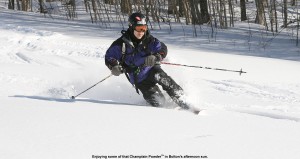 An image of Jay Telemark skiing in the powder on Spell Binder at Bolton Valley Ski Resort in Vermont