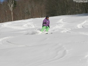 An image of Stephen cutting tracks through the powder on the Spell Binder trail at Bolton Valley Ski Resort in Vermont