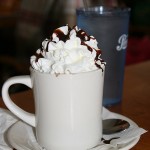 An image of Hot Chocolate topped with whipped cream at the James Moore Tavern at Bolton Valley Ski Resort in Vermont