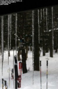 An image of icicles outside one of the windows of the Bryant Cabin on the Nordic & backcountry network at Bolton Valley Ski Resort in Vermont