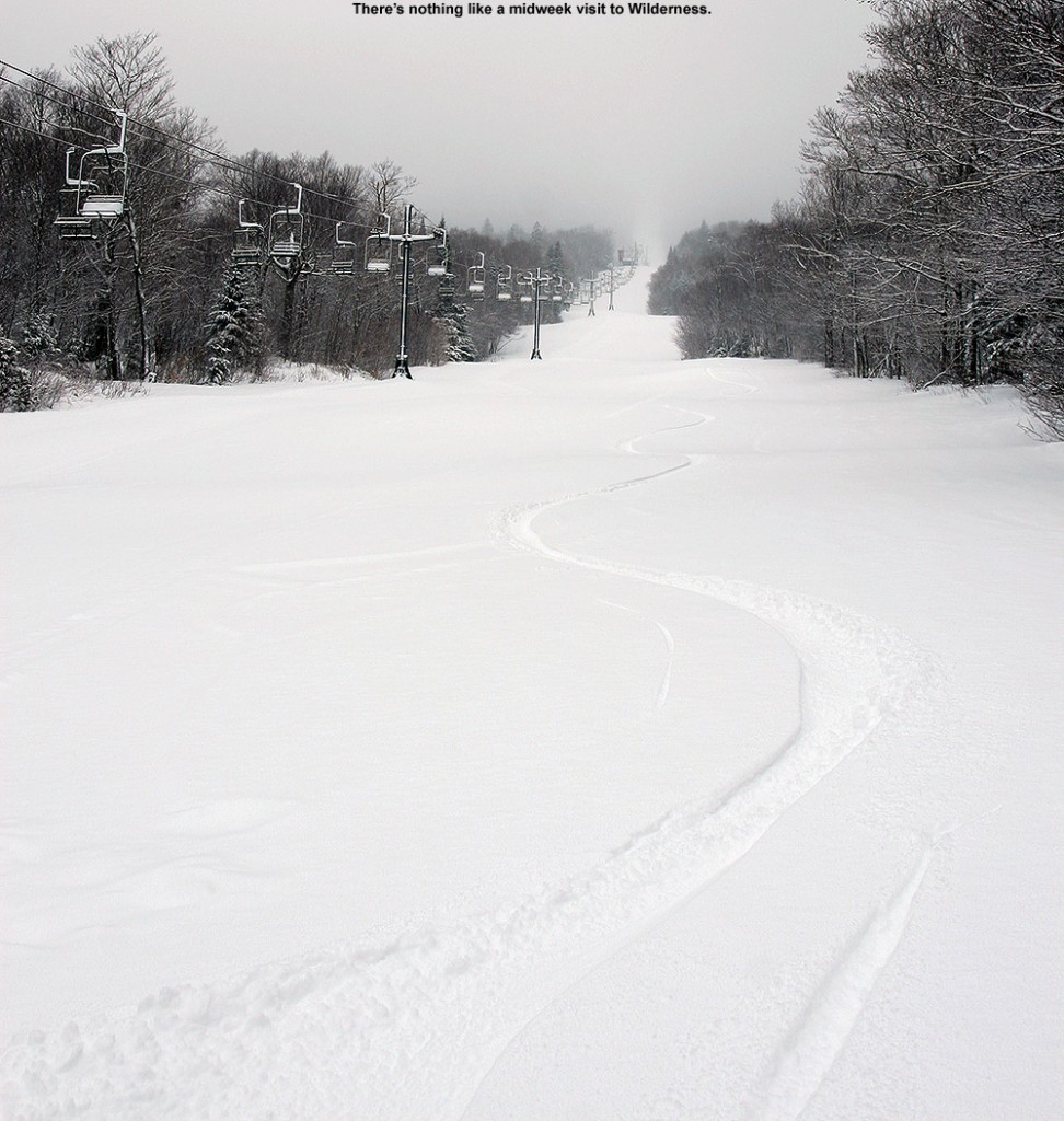 An image of ski tracks in fresh powder on the Wilderness Lift Line at Bolton Valley Ski Resort in Vermont