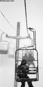 An image taken while riding the Mid Mountain Chair at Bolton Valley Ski Resort in Vermont showing heavy snowfall obscuring the view