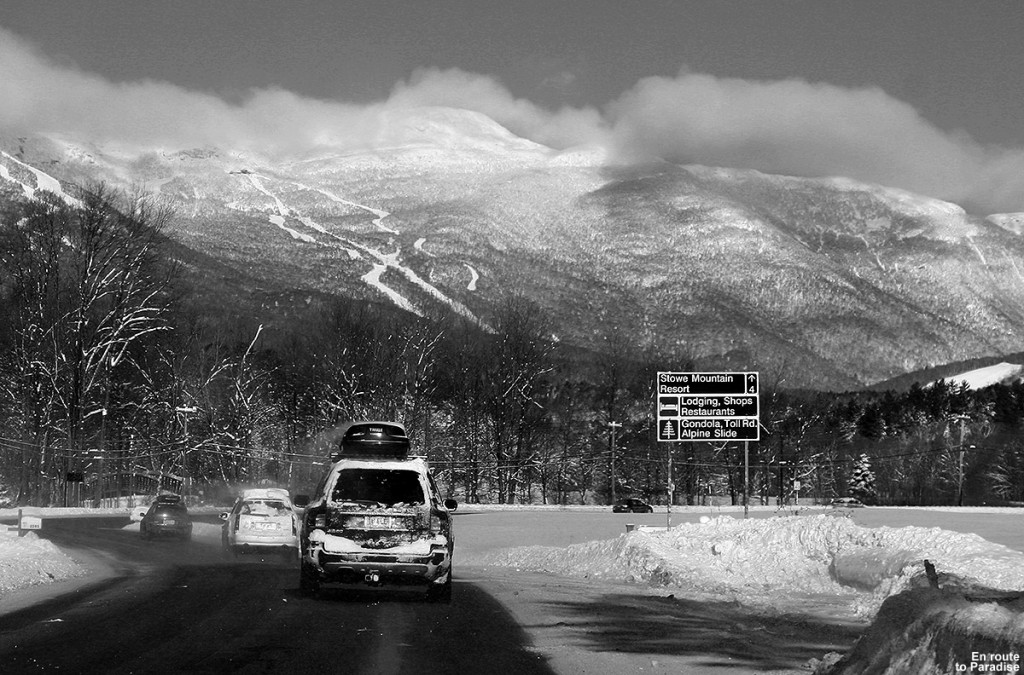 An image of Mt. Mansfield and some of Stowe Mountain Resort's snowy ski trails as we approach on the Mountain Road