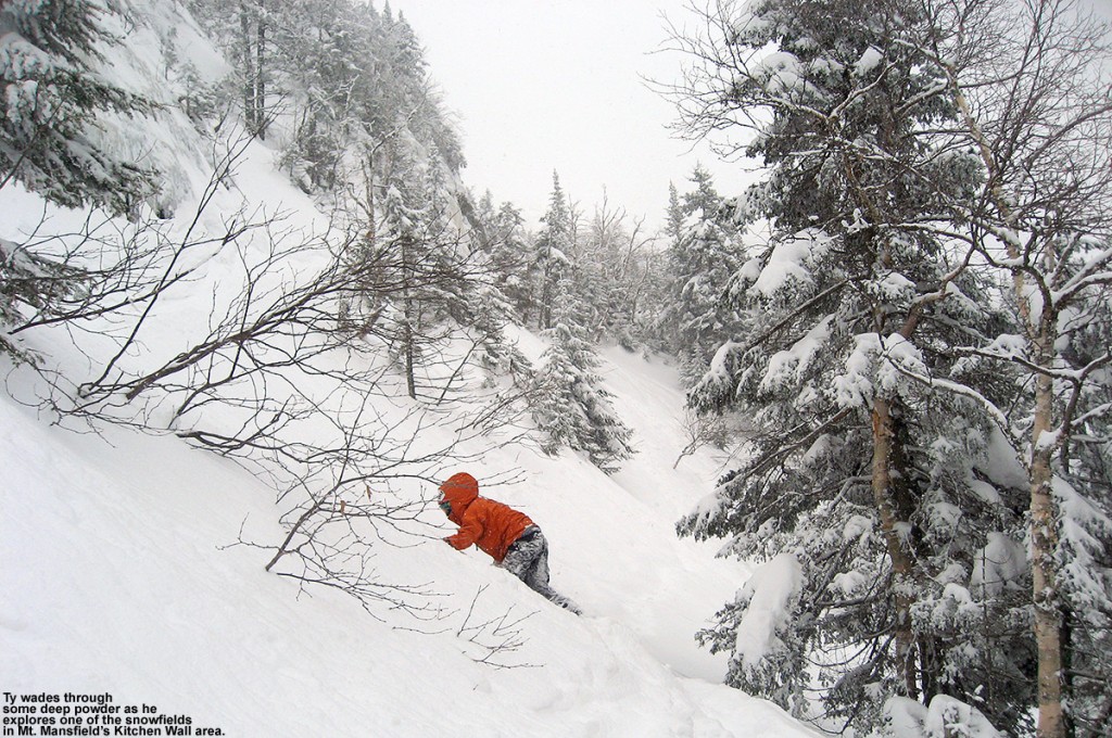An image of Ty exploring deep snow in a steep snowfield in the Kitchen Wall area at Stowe Mountain Ski Resort in Vermont