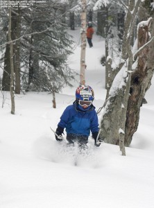 An image of Dylan skiing fresh powder in the Villager Trees at Bolton Valley Ski Resort in Vermont