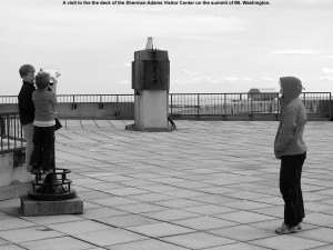 An image of Erica, Ty, and Dylan on the observatory deck of Mount Washington State Park's Sherman Adams Visitor Center at the summit of Mount Washington in New Hampshire