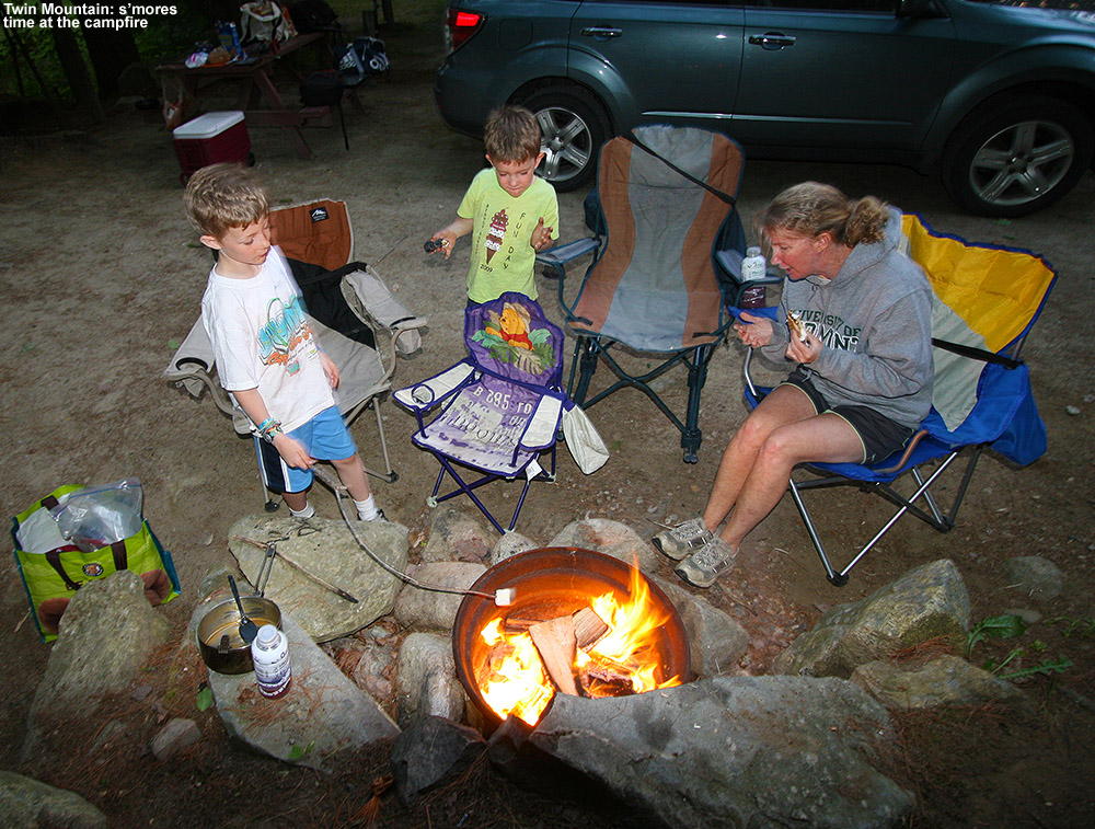 An image of Erica, Ty, and Dylan around a campfire making s'mores at the Twin Mountain KOA campground in New Hampshire on Memorial Day weekend 2012