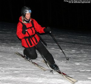 An image of Erica skiing the North Slope trail at Stowe Mountain Resort in Vermont near dusk