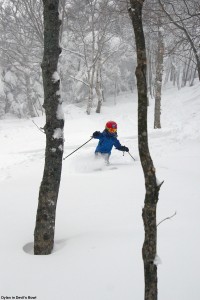An image of Dylan skiing some powder in the Devil's Bowl area at Bolton Valley Ski Resort in Vermont