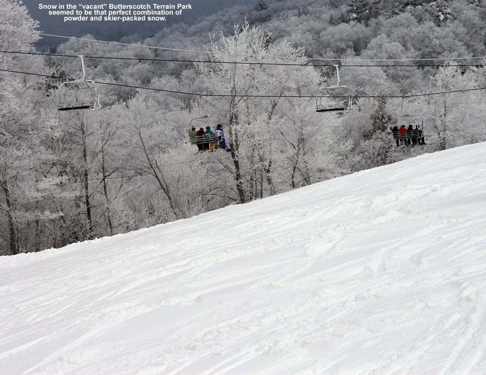 An image of the Butterscotch Terrain Park with chopped up powder and the Vista Quad Chairlift in the background at Bolton Valley Ski Resort in Vermont