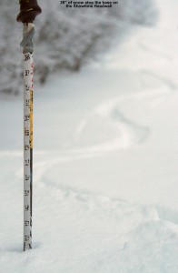An image showing the snow depth of 26 inches above the base on the Showtime trail at Bolton Valley Ski Resort in Vermont 