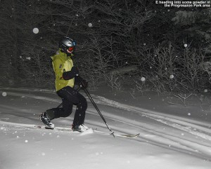 An image of Erica night skiing in a bit of powder in the Progression Terrain Park at Bolton Valley Ski Resort in Vermont