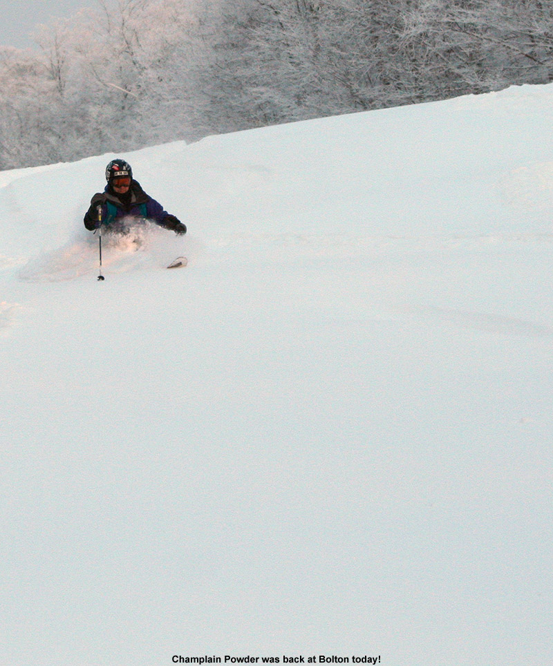 An image of Jay Telemark skiing in powder on the Showtime trail at Bolton Valley Ski Resort in Vermont