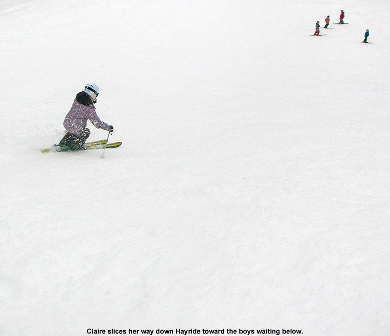 An image of Claire skiing the Hayride trial at Stowe Mountain Resort in Vermont