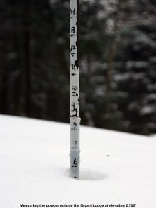 An image showing a measurement of the powder snow depth atop the base outside the Bryant Cabin on the backcountry ski trail network at Bolton Valley Resort in Vermont