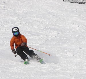 An image of Ty skiing in soft snow in the Meadows area at Stowe Mountain Resort in vermont